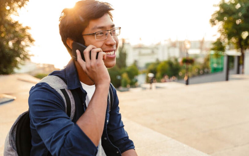 Man Talking On Phone