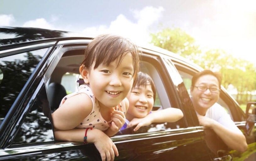 Family Riding in Vehicle