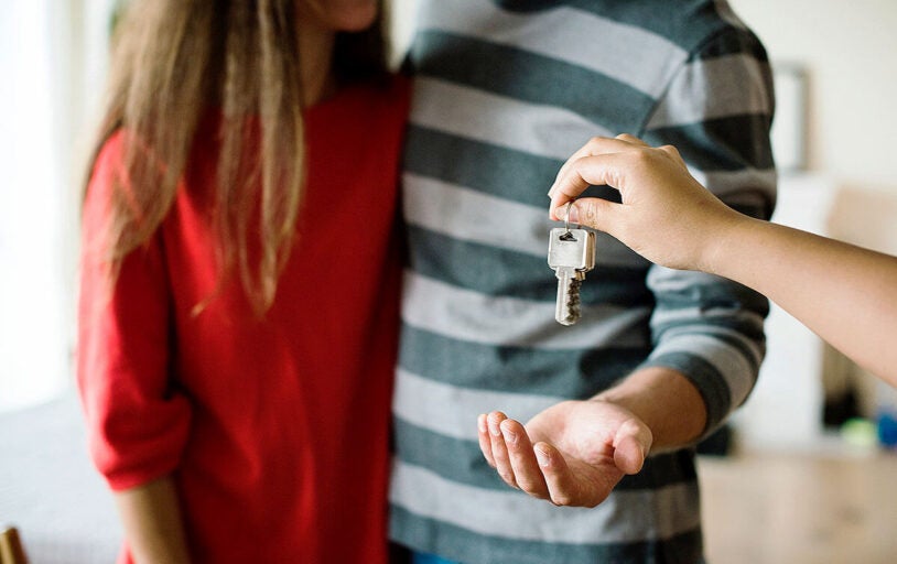 Couple receiving house key