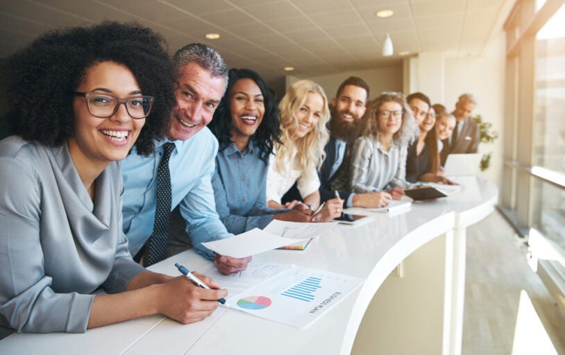 Happy coworkers smiling