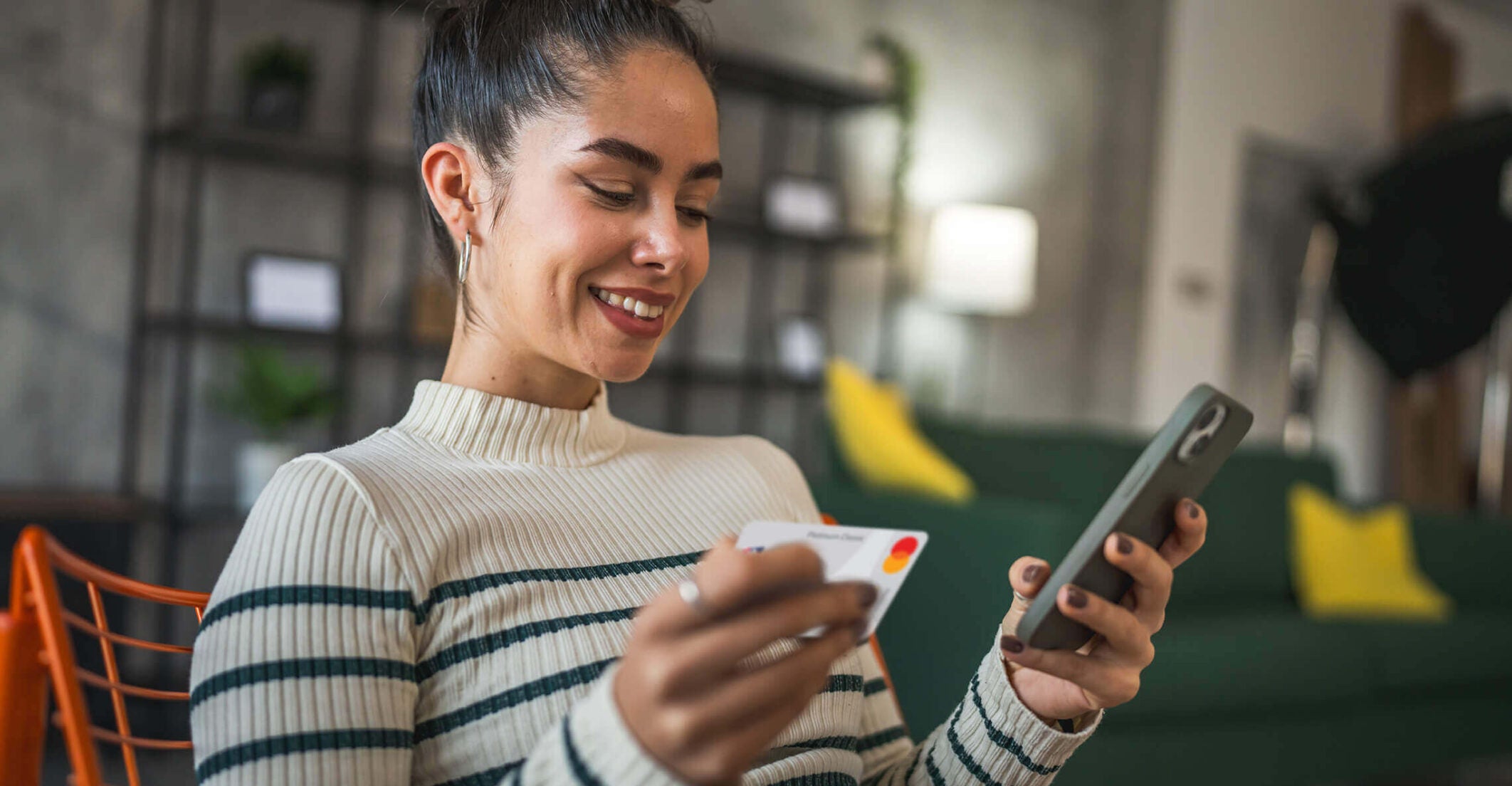 woman holding credit card