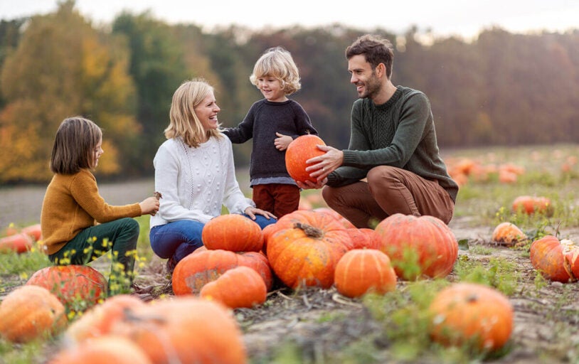 family at pumpkin patch